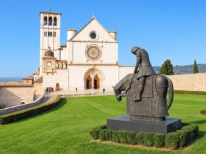 Basilica of Saint Francis in Assisi under a clear blue sky