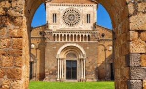 San Pietro church in Tuscania under a clear blue sky